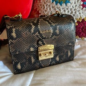 VALENTINO BY MARIO VALENTINO Snakeskin crossbody structures purse.